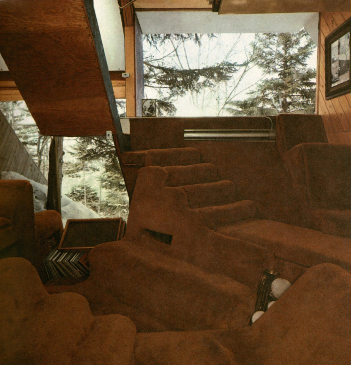 Vintage image of the interior of a snowy mountain home covered in carpeting from the pages of the book Underground Interiors.