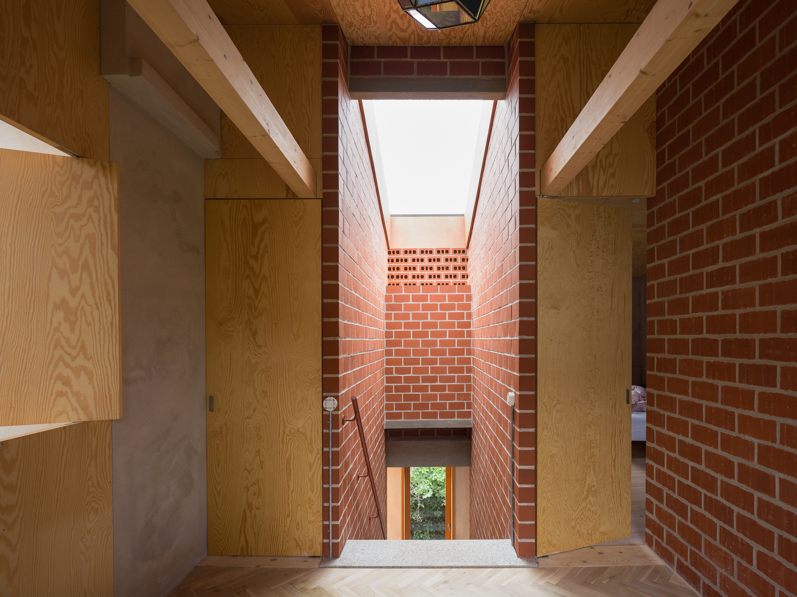 The top of a brick stairway in art historian and curator Marianne Krogh's Copenhagen home.