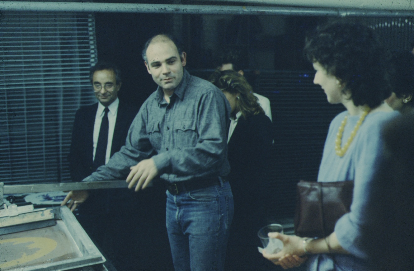 Printmaker John Nichols of JNP&P giving a studio tour of his print shop in 1985