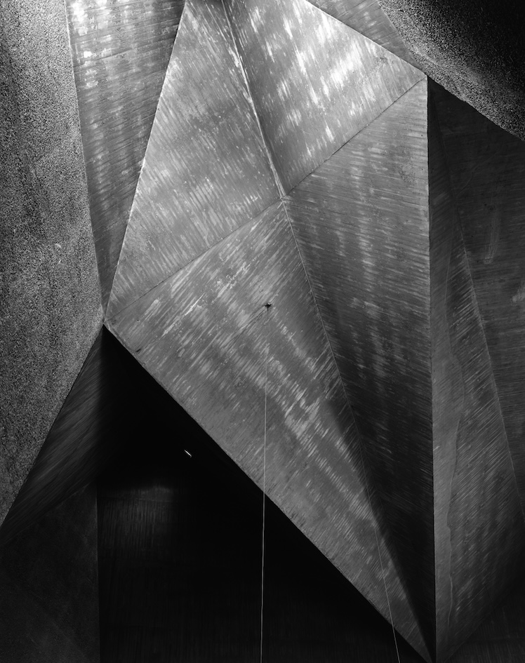 Black and white detail shot of the structure and angels of Gottfried Böhm’s Parish Church of St. Gertrude in Düsseldorf, Germany